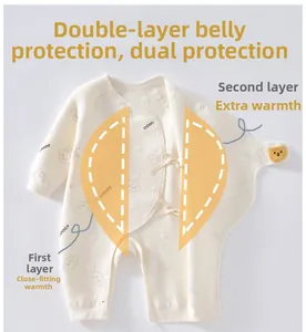 Detail of newborn baby romper with double-layer belly protection and cartoon dog print