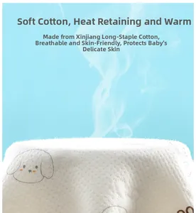 Macro detail of breathable cotton baby fabric with puppy prints and steam test