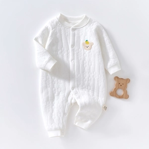Padded white cotton romper for newborns featuring cute bear embroidery and waffle knit texture