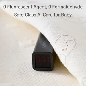 Fluorescence detector showing 0.00 reading on soft patterned newborn cotton romper
