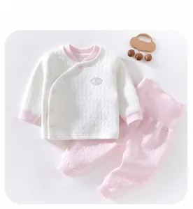 Quilted baby thermal clothing set with pink trim and matching high-waisted pants