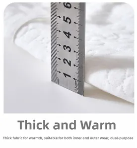 Vue macro de tissu en coton matelassé de 3mm pour vêtement thermique hiver bébé