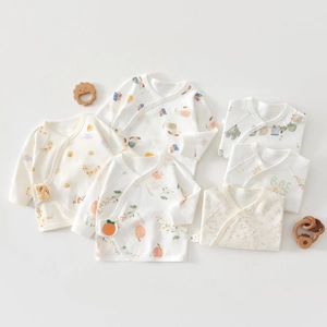 Detail of 100% cotton newborn kimono tops featuring diverse cute animal and fruit prints