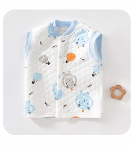 Detail of quilted baby vest with cartoon lion print and convenient snap buttons