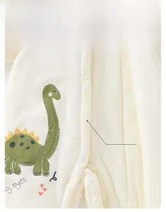 Close-up of baby romper with warm fleece fabric and food-grade resin snap buttons