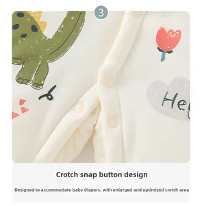 Detail of snap button closure on dinosaur print baby romper for easy diaper changes