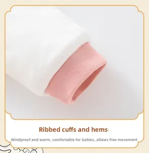 Close-up of elastic ribbed cuffs on a baby winter jumpsuit made of soft knit fabric