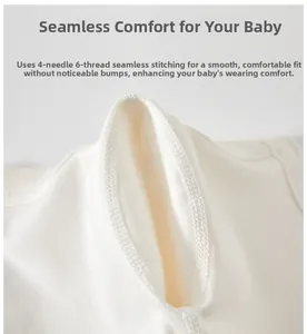 Detail of 4-needle 6-thread flatlock seam on soft cream-white cotton baby bodysuit