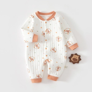 Detail of baby quilted cotton romper with bear prints and ribbed collar and cuffs