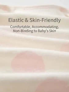 Soft cotton newborn bodysuit with pink polka dots and elastic skin-friendly texture