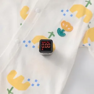 Short sleeve baby cotton romper with floral print and neon-free safety testing view