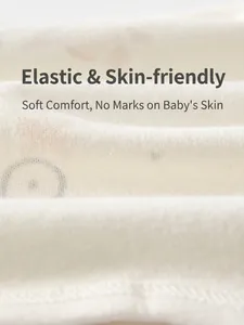 Close-up of soft cotton baby garment fabric in cream with elastic skin-friendly texture