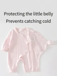 Pink rib-knit newborn bodysuit with crown embroidery and tie-front closure design
