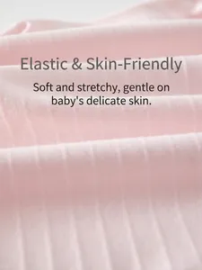 Soft pink ribbed cotton baby romper fabric texture with high elasticity and skin-friendly feel