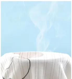 Close-up showing high breathability and texture of 100% long-staple cotton baby fabric