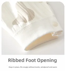 Detail of soft ribbed cotton baby romper cuffs with secure snap buttons for warmth