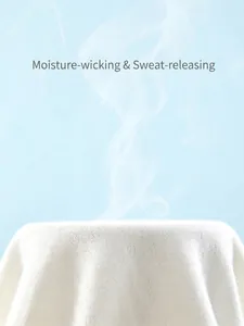 Breathable white cotton infant bodysuit fabric showing high moisture-wicking properties