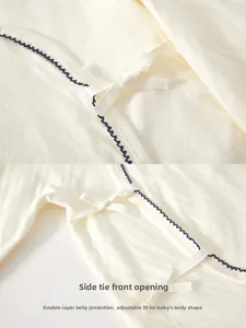 Detail of baby kimono romper with side-tie closure and reinforced double-layer belly guard