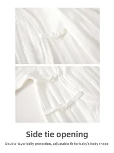 Detail of baby bodysuit featuring side-tie closure and double-layer belly protection