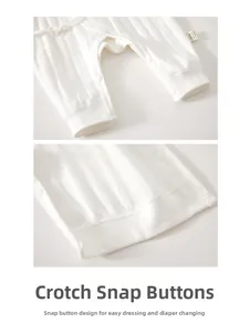 Detail of baby cotton romper showing convenient snap buttons at the crotch for diaper change
