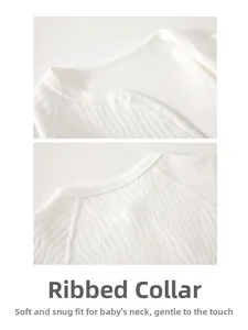 Macro view of soft piped neckline and resin snap button on organic cotton baby bodysuit