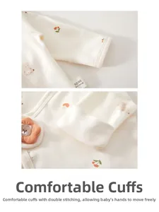 Detail of ribbed cuffs on 100% cotton newborn top with lion decor and cute prints