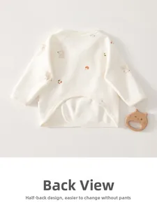 Detail of newborn baby wrap top featuring cute bear prints and convenient half-back design