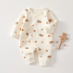Close-up of baby romper waffle texture and panda print with A-class safety label
