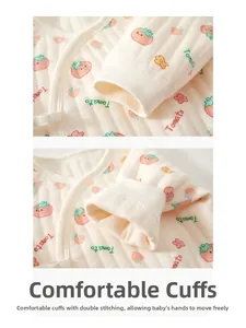 Macro detail of quilted baby romper fabric with tomato print and ribbed elastic cuffs