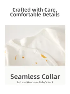 Close-up of baby romper binding neckline with yellow moon print and snap button