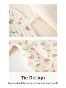 Detailed view of the ribbed fabric and lace-up closure on this baby thermal jumpsuit
