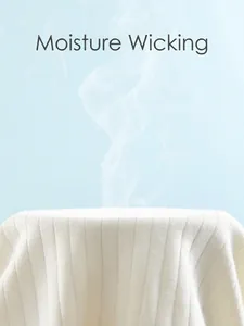 Breathable cotton rib knit baby romper in beige showing steam for ventilation