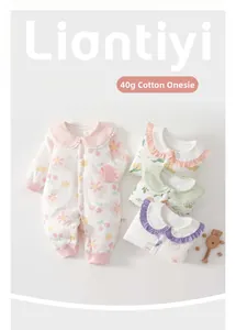 Detail of 40g cotton newborn romper with floral pattern and lace Peter Pan collar