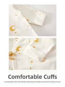 Detail of newborn cotton shirt featuring double-stitched cuffs and star moon prints