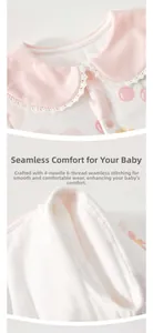 Detail of baby cotton romper showing lace doll collar and smooth bone-free seam sewing
