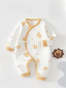 Detail of baby quilted romper with cute bear prints and side-tie kimono closure