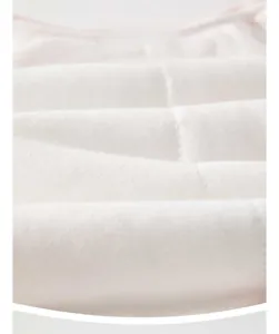 Detailed macro view of high-elasticity breathable white cotton knit fabric for baby clothing