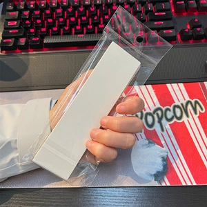 Close-up of 30 blank white bookmarks in clear retail packaging with a hanging hole
