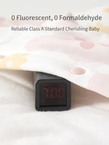 Newborn floral cotton bodysuit featuring safety testing for zero formaldehyde and fluorescent
