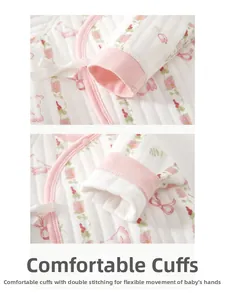 Detail of comfortable cuffs on a floral quilted baby bodysuit with double stitching