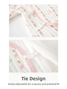 Detail of baby kimono romper featuring soft cotton fabric and secure lace-up closure design