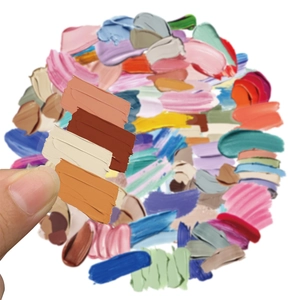 Detailed view of waterproof oil painting texture PET stickers being applied by hand