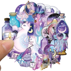 Detail of magic witch PET stickers with holographic film showing purple moon and cat motifs