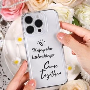 Enjoy The Little Things transparent iPhone case featuring black cursive text and floral background