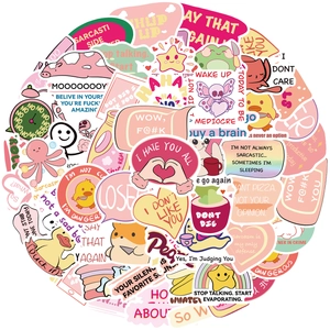 Detail showing various pink waterproof sarcasm stickers for laptops and guitars