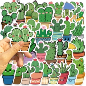 Close-up of hand holding a waterproof cartoon cactus sticker showing size and die-cut edge