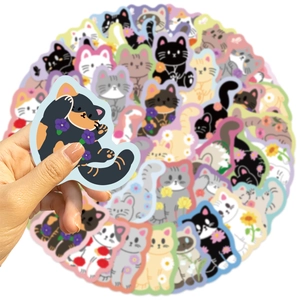 Detailed view of waterproof PVC cat stickers with colorful floral borders and designs