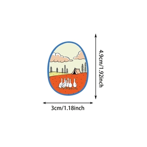 Oval outdoor camping sticker showing ducks and tents with dimensions 4.9cm by 3cm
