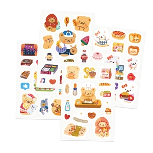 Detail showing three sheets of cute cartoon bear stickers for scrapbooking and DIY decor