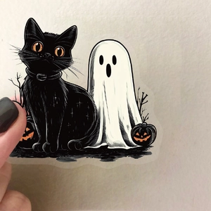 Detailed view of semi-transparent Halloween black cat, ghost and pumpkin stickers